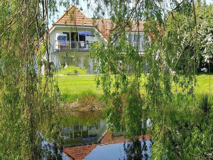 Ferienwohnung für 5 Personen, mit Balkon und Garten sowie Seeblick und Ausblick in Gingst