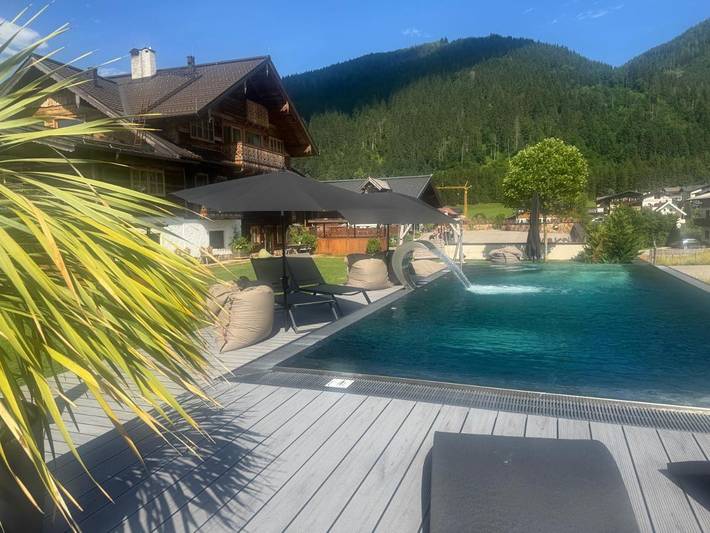Ferielejlighed for 6 personer, med sauna og have såvel som pool og jacuzzi, børnevenlig i Flachau