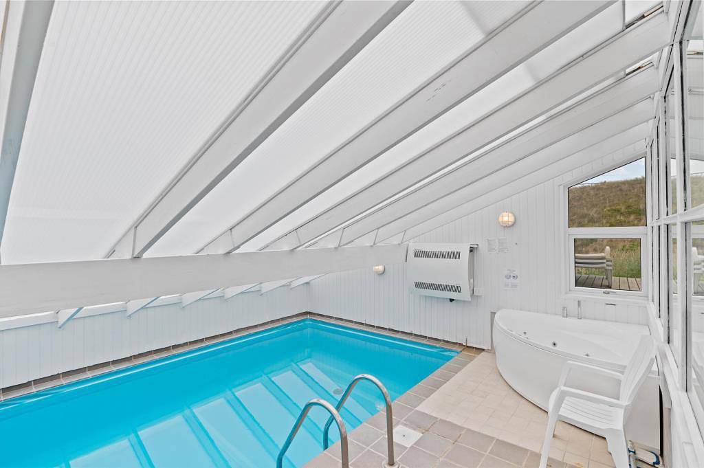 Großes Poolhaus auf Dünengrundstück für 8 Personen in Skodbjerge, Hvide Sande