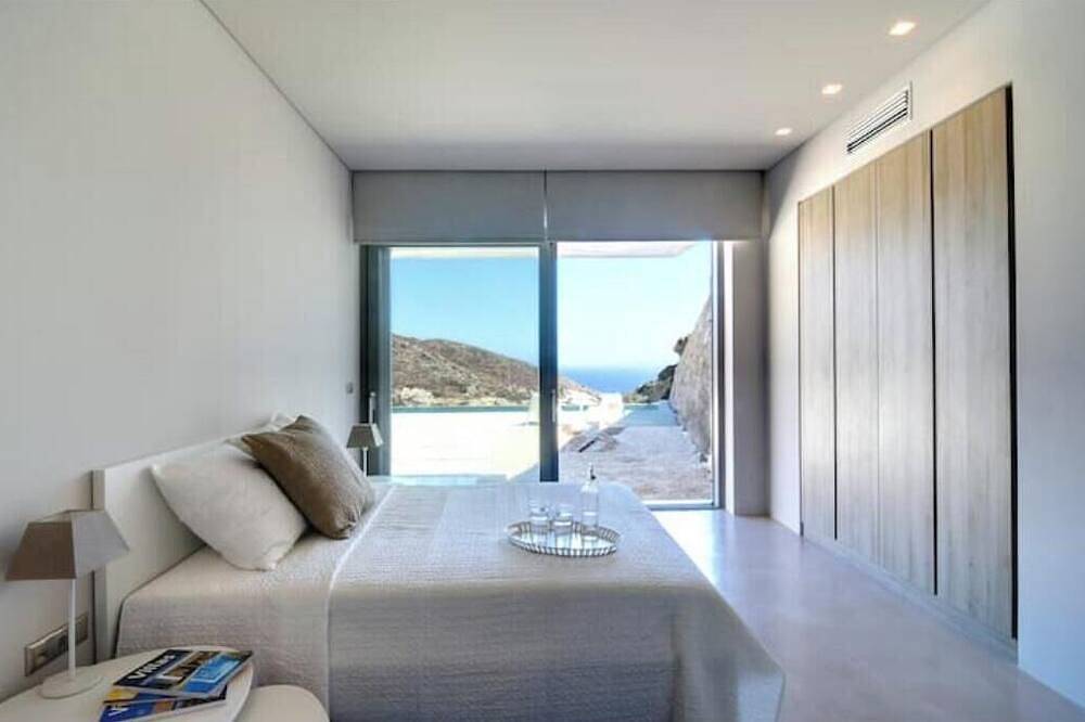 Aetos Cave Villa | Sunset Sea Views, 2 Infinity Pools & Private Luxury Retreat in Mylopotas, Ios
