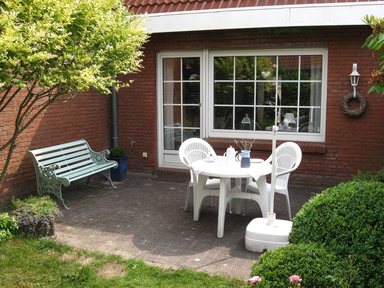 Ferienhaus 'Nes Pük' mit gemeinsamer Terrasse, gemeinsamem Garten und Wlan in Hooksiel, Metropolregion Bremen-Oldenburg