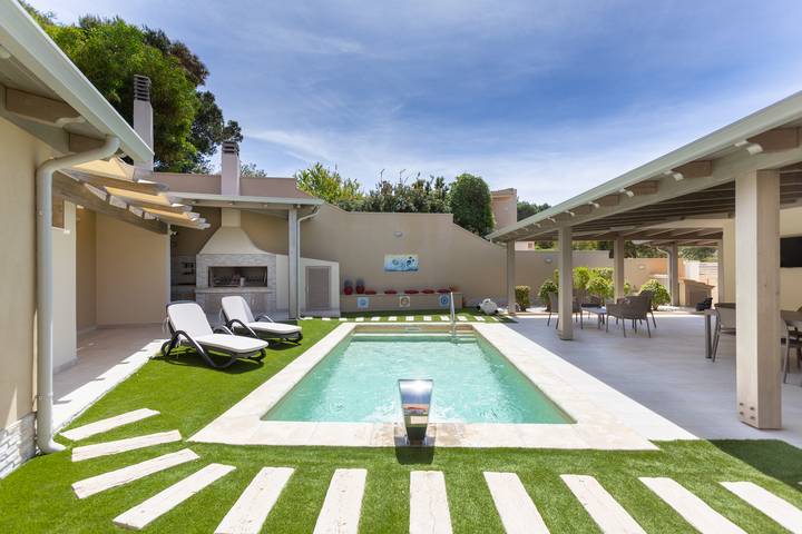 Casa vacanza per 6 persone, con Terrazza e Giardino nonché Panorama a Porto Pino