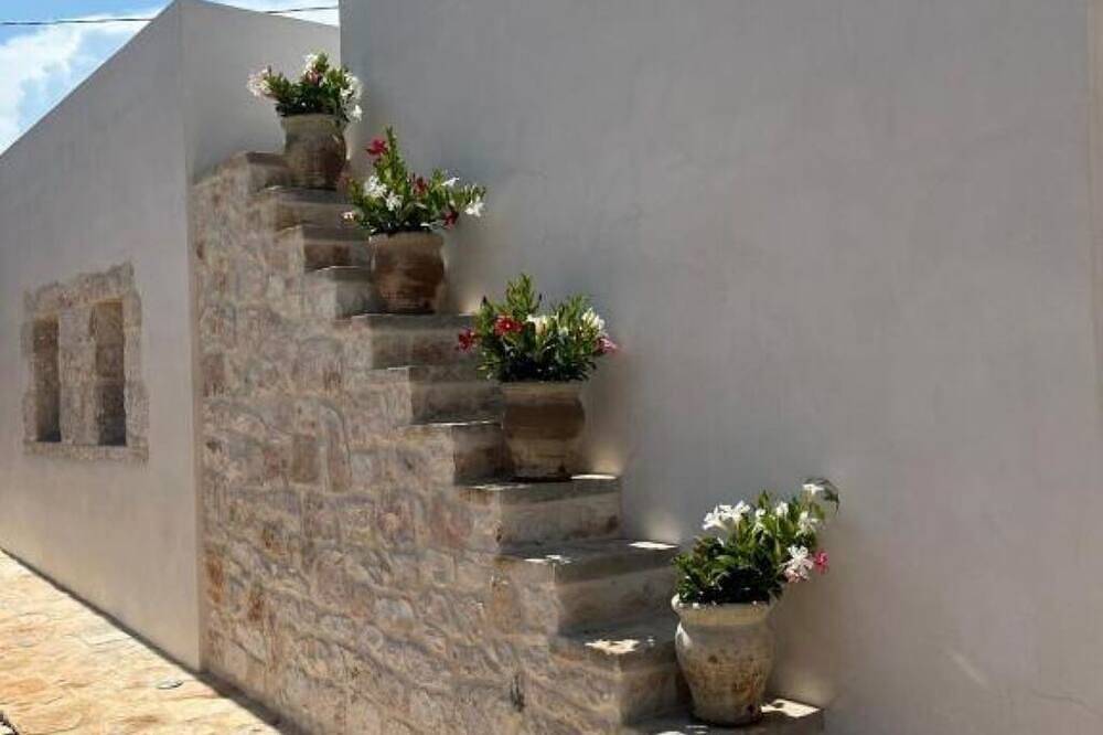Domus Petri 1908 Melograno - Trulli con piscina in Valle d'Itria in Cisternino, Salento