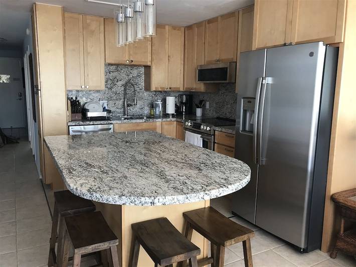 Vacation rental for 6 people, with pool and yard as well as balcony in Puako