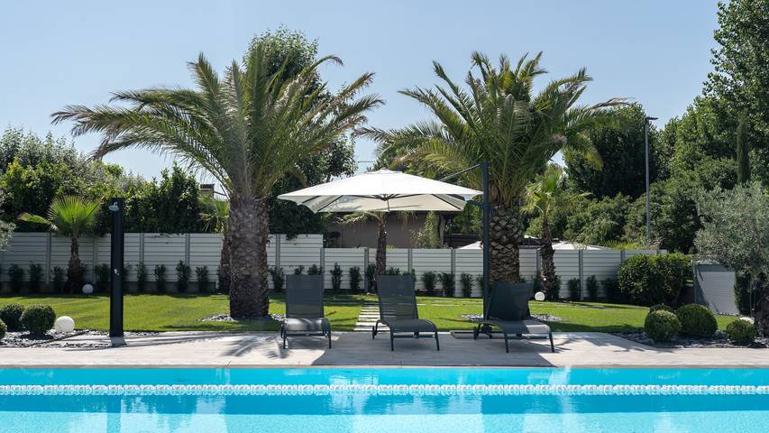 Villa für 8 Personen, mit Balkon und Garten sowie Sauna und Seeblick