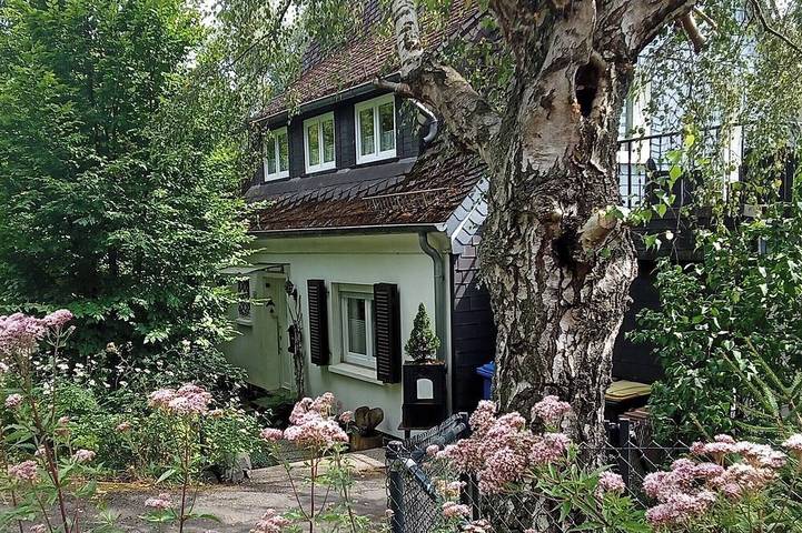 Ferienhaus für 4 Personen, mit Balkon und Garten