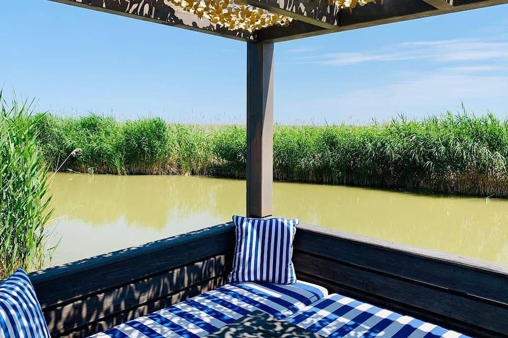 Seehütte Neusiedlersee \"Sonnendeck\" - Ferienhaus, Dusche, Wc in Rust (Burgenland), Leithaberg
