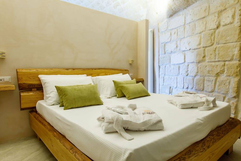 Appartamento intero, Suite in grotta con terrazza e vista sui Sassi di Matera in Sassi di Matera, Matera