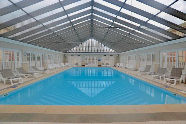 Appartement de vacances pour 4 personnes, avec piscine ainsi que vue et jardin, animaux acceptés