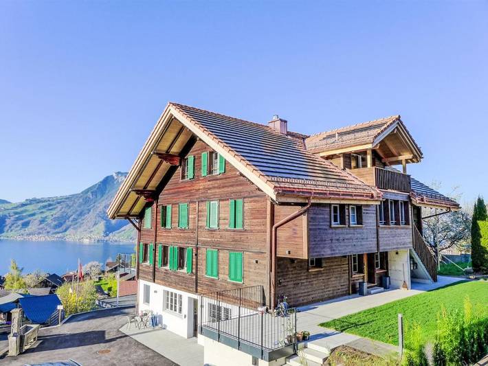 Gîte pour 3 personnes, avec terrasse et vue sur le lac à Krattigen