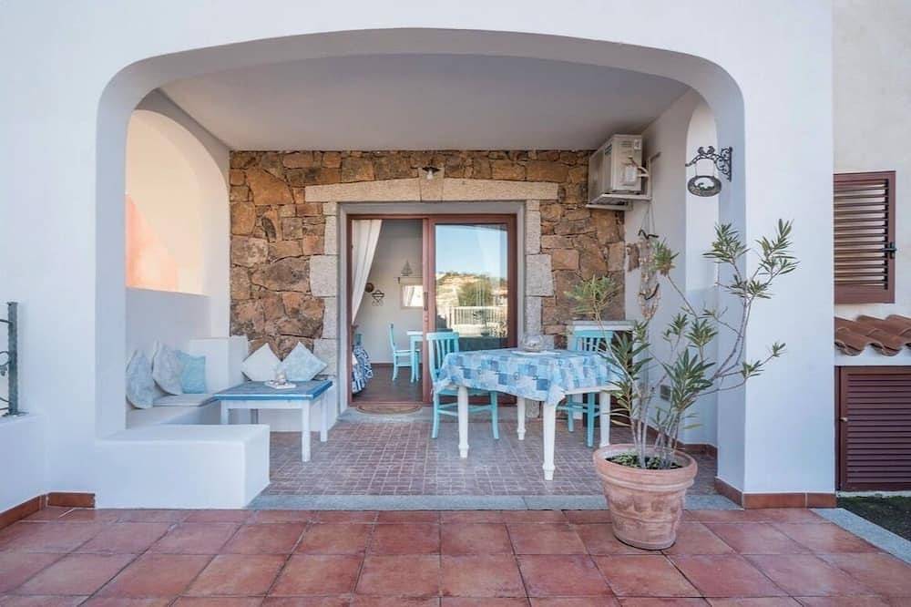 Appartamento intero, Appartamento accogliente in stile Beach-House adatto per coppie . in Flumini, Posada
