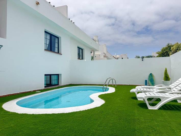 Casa de huéspuedes para 6 personas, con jardín y piscina en Corralejo