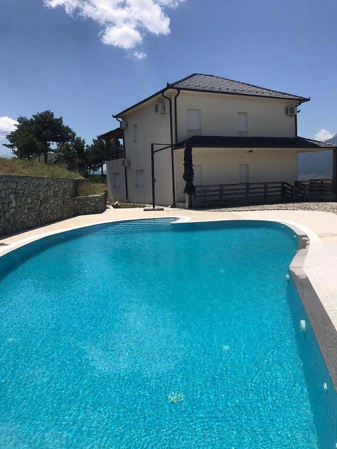 Maison de vacances pour 10 personnes, avec piscine et balcon ainsi que vue et jardin, animaux acceptés