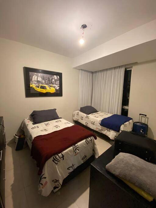 Appartement de vacances pour 3 personnes, avec piscine et sauna ainsi que vue et jardin