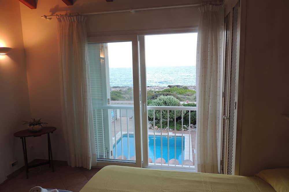 House with direct sea view, close to the beach and marina in Cala en Bosc, Ciutadella