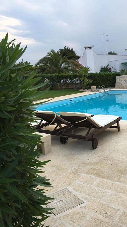 Casa vacanza per 8 persone, con Giardino e Piscina nonché Panorama a Rosa Marina