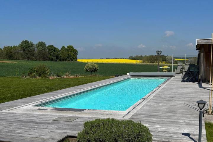 Location de vacances pour 2 personnes, avec Terrasse et Jacuzzi ainsi que Jardin et Piscine dans Sart-Dames-Avelines