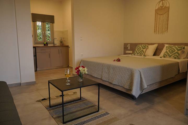 Appartement de vacances pour 3 personnes, avec jardin ainsi que terrasse et vue sur l’océan