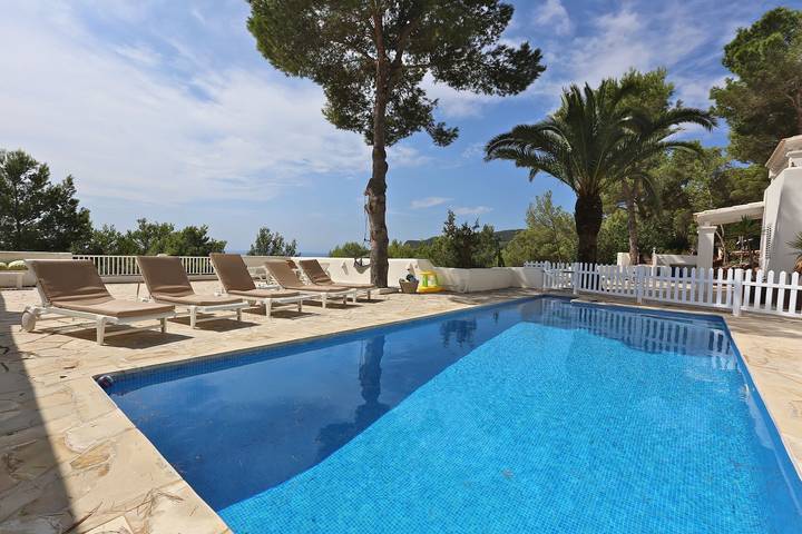 Villa pour 12 personnes, avec jardin et balcon à Es Cubells