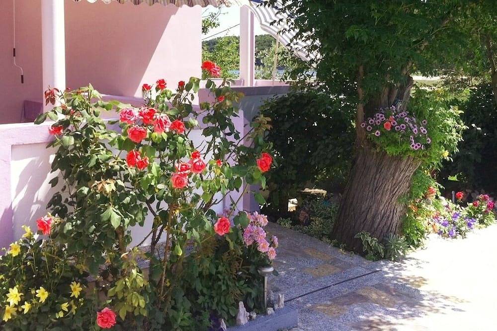 Apartamento entero, Apartamento de tres habitaciones con una terraza Kampor, Rab (A-4985-a) in Kampor, Rab