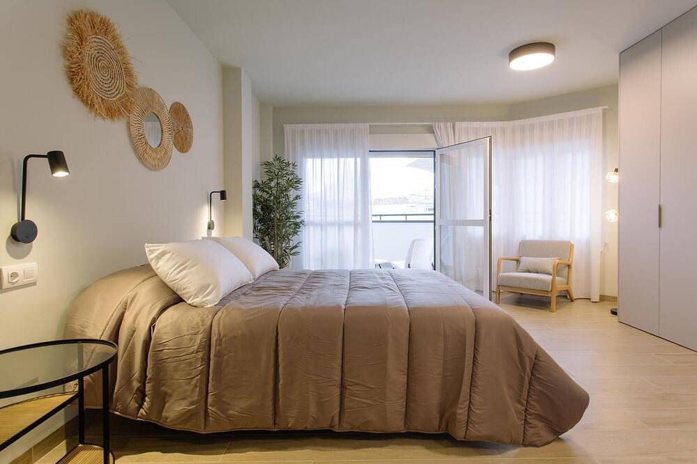 Apartamento entero, Apartamento 'Apartamento 1-02' con piscina compartida, Wi-Fi y aire acondicionado in Alfàs del Pi, Costa Blanca