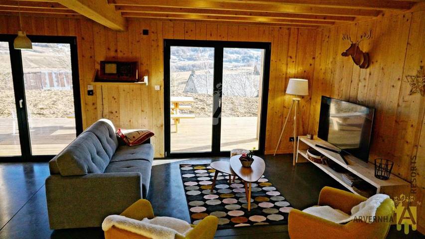 Chalet pour 8 personnes, avec terrasse et vue ainsi que jardin et sauna à Chambon-sur-Lac - 4