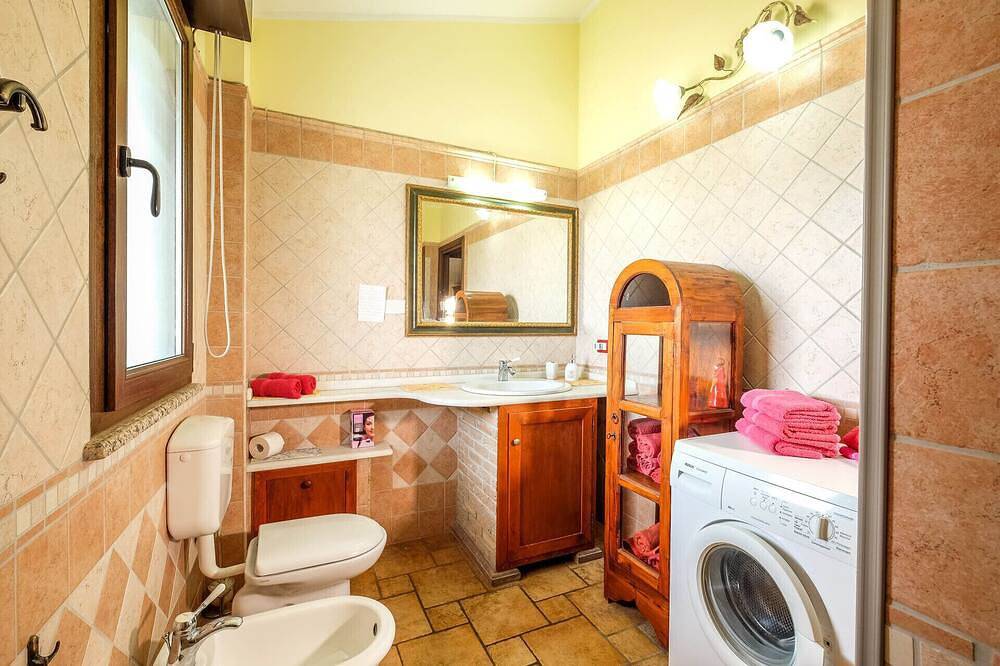 Appartamento intero, Sensazione di vacanza in una tranquilla zona appartamento uliveto con Wi-Fi! in Gonnesa, Iglesiente