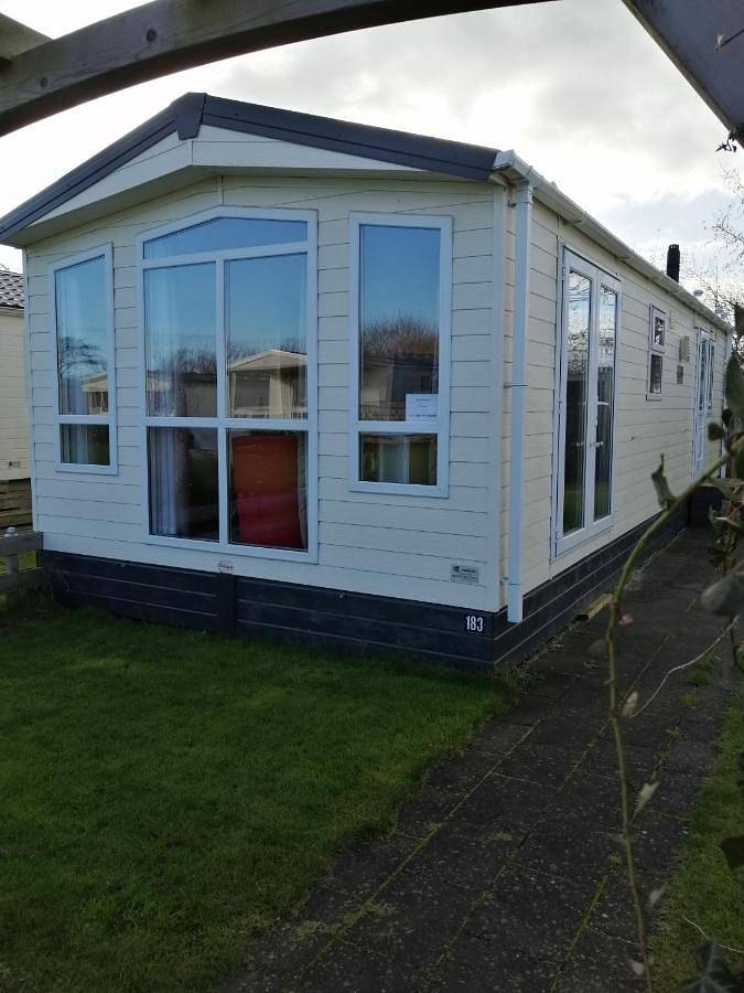 Ferienhaus für 5 Personen, mit Terrasse und Garten sowie Pool und Ausblick in Petten