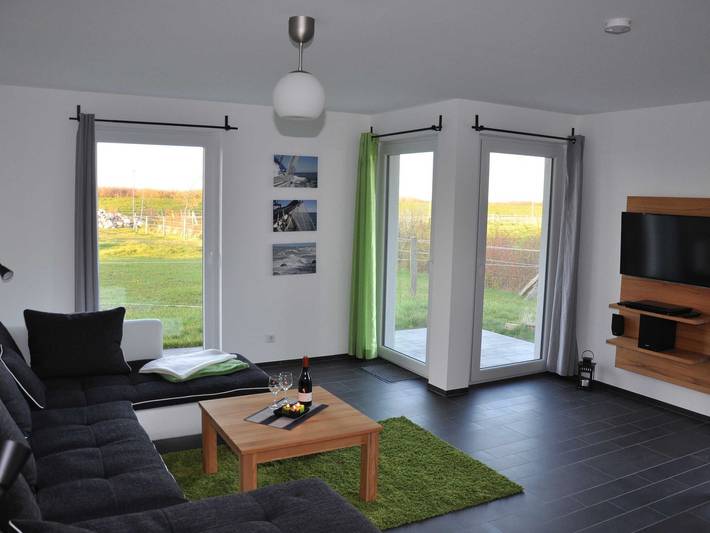 Ferienwohnung für 4 Personen, mit Sauna und Terrasse sowie Garten in Börgerende-Rethwisch