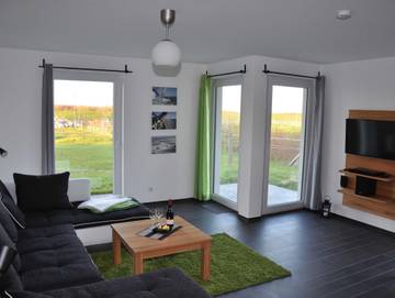 Ferienwohnung für 4 Personen, mit Garten und Sauna sowie Terrasse in Börgerende-Rethwisch