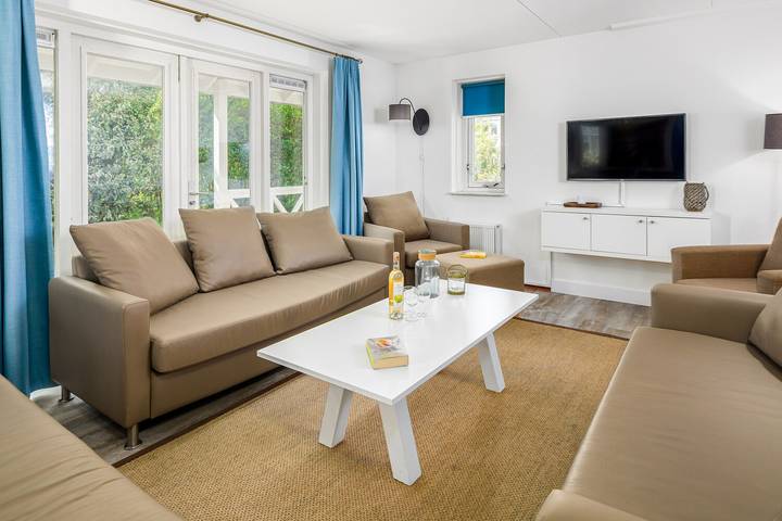 Bungalow für 10 Personen, mit Balkon/Terrasse und Balkon sowie Terrasse und Garten