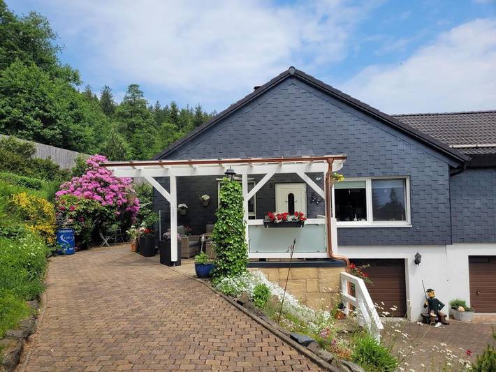 Ferienwohnung für 3 Personen, mit Terrasse und Garten sowie Kinderpool und Ausblick in Lautenthal