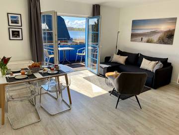 Ferienwohnung für 4 Personen, mit Garten und Seeblick sowie Terrasse, mit Haustier am Selliner See