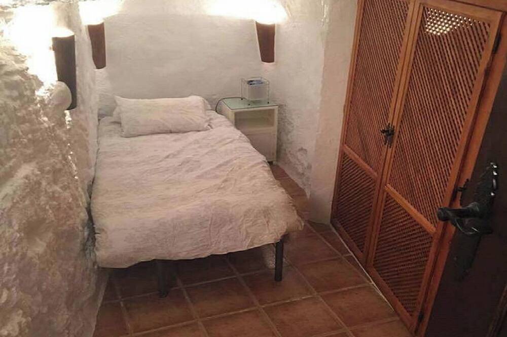 Cave House with a spectacular view of the village and across to Sagra in Galera, Geoparque de Granada