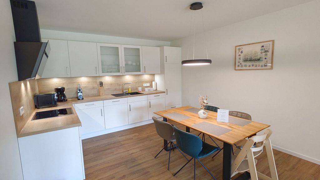 Ganze Wohnung, Schöne Tiet – Frische Auszeit. Modern. Terrasse mit Rasenfläche. Strandnah. in Tossens, Butjadingen