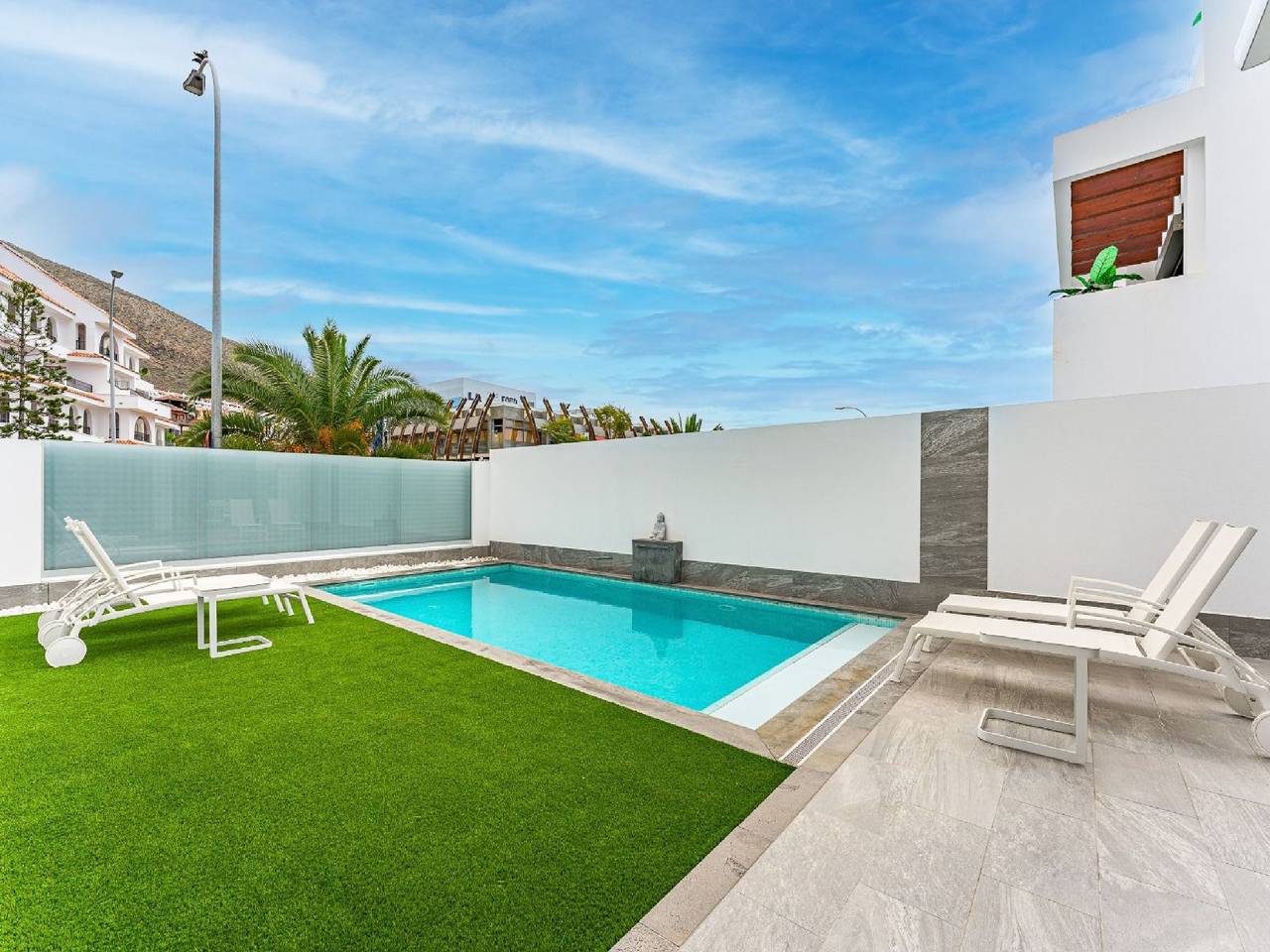 Villa Los Cristianos Deluxe | Prime Location |  Private Heated Pool with Waterfall | Outdoor Dining & Bbq in Los Cristianos, Arona