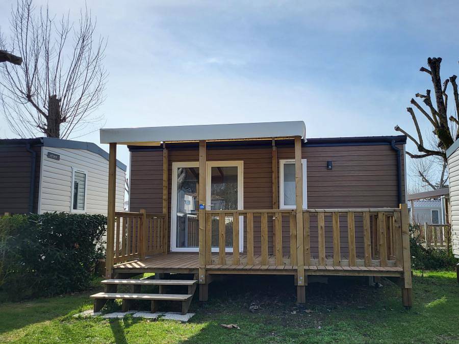 Flower Camping Le Nauzan Plage  - Mobilhome 4 personnes - Mobil-home Confort 22m² - 2 chambres - terrasse semi-couverte +Tv 4 pers in Vaux-sur-Mer, Côte de Beauté