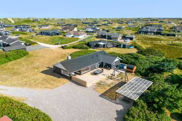 Ferienhaus für 10 Personen, mit Whirlpool und Sauna sowie Terrasse, mit Haustier in Søndervig