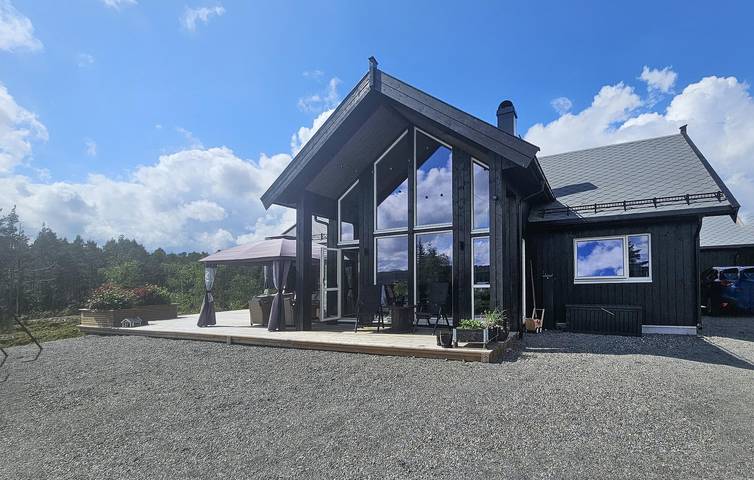 Ferienhaus für 10 Personen, mit Terrasse und Garten sowie Seeblick - 1