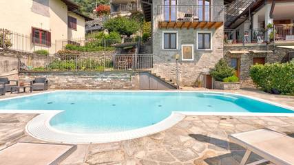 Ferienhaus für 2 Personen, mit Seeblick und Balkon sowie Garten und Pool am Comer See
