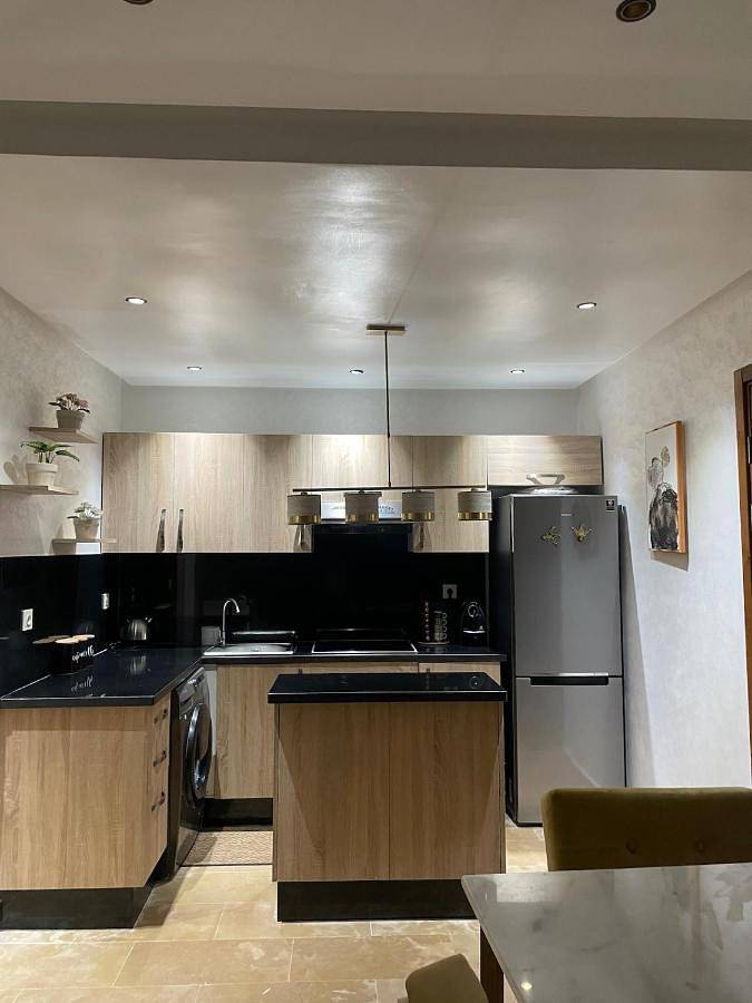 Appartement de vacances pour 5 personnes, avec terrasse ainsi que piscine et jardin