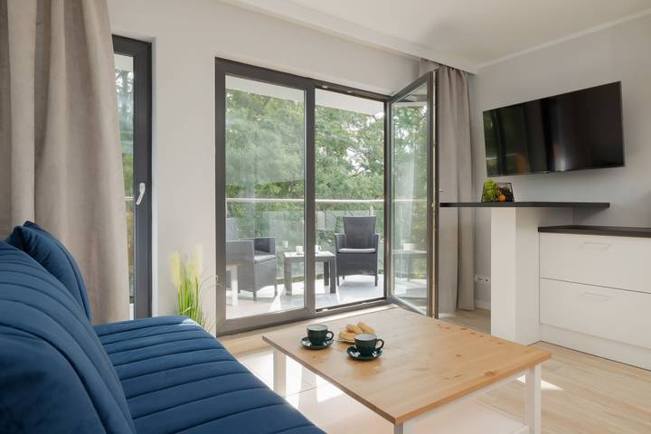 Ferienwohnung für 4 Personen, mit Balkon und Whirlpool sowie Terrasse und Sauna