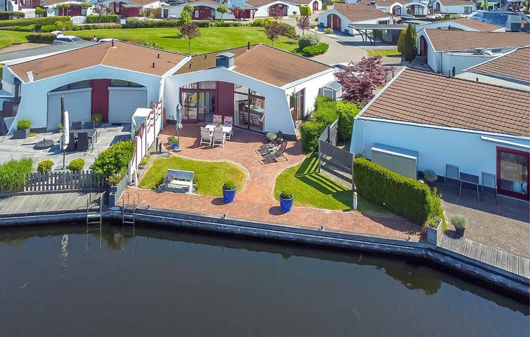 Ferienhaus für 4 Personen, mit Ausblick und Terrasse sowie Garten - 1