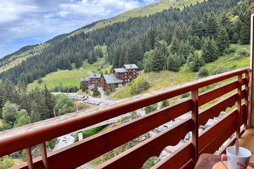 Apartamento entero, Estudio acogedor con balcón · A pie de pistas · Cerca del centro in Méribel-Mottaret, Les Allues