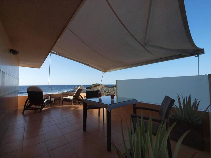 Vacation Home 'Sunrise Directly by the Sea' with Sea View, Private Terrace and Wi-Fi in Playa del Río (Granadilla de Abona), Arico
