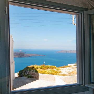 Gîte pour 4 personnes, avec balcon et vue, adapté aux familles dans Firostefani