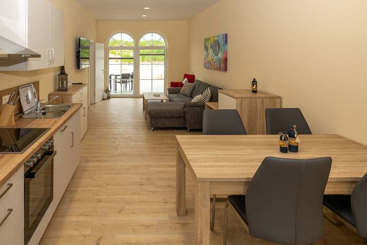Ferienwohnung für 4 Personen, mit Terrasse und Garten sowie Sauna in Gützkow