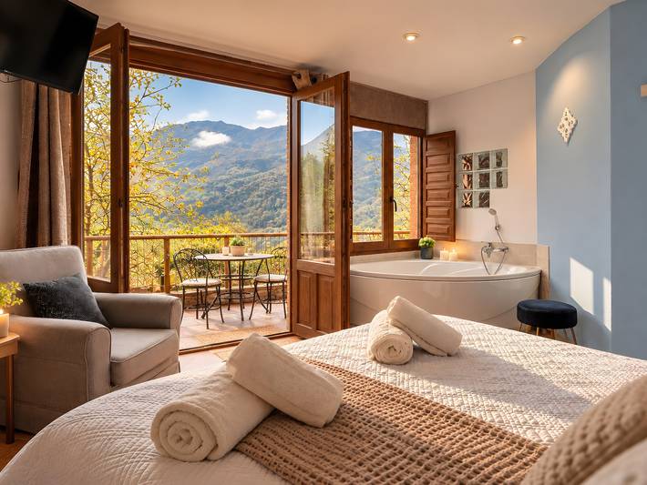 Geheel appartement, Appartement 'El Ablanu, bubbelbad en uitzicht' met bergzicht, terras en wifi in Proaza, Cantabrisch Gebergte