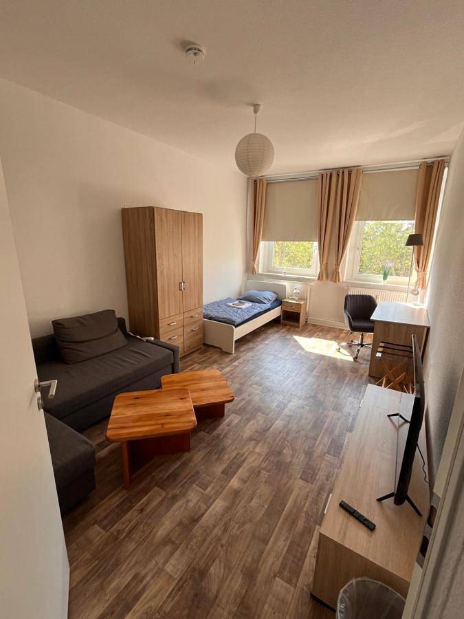 Ferienwohnung für 8 Personen, mit Garten und Balkon sowie Ausblick in Leipziger Buchmesse
