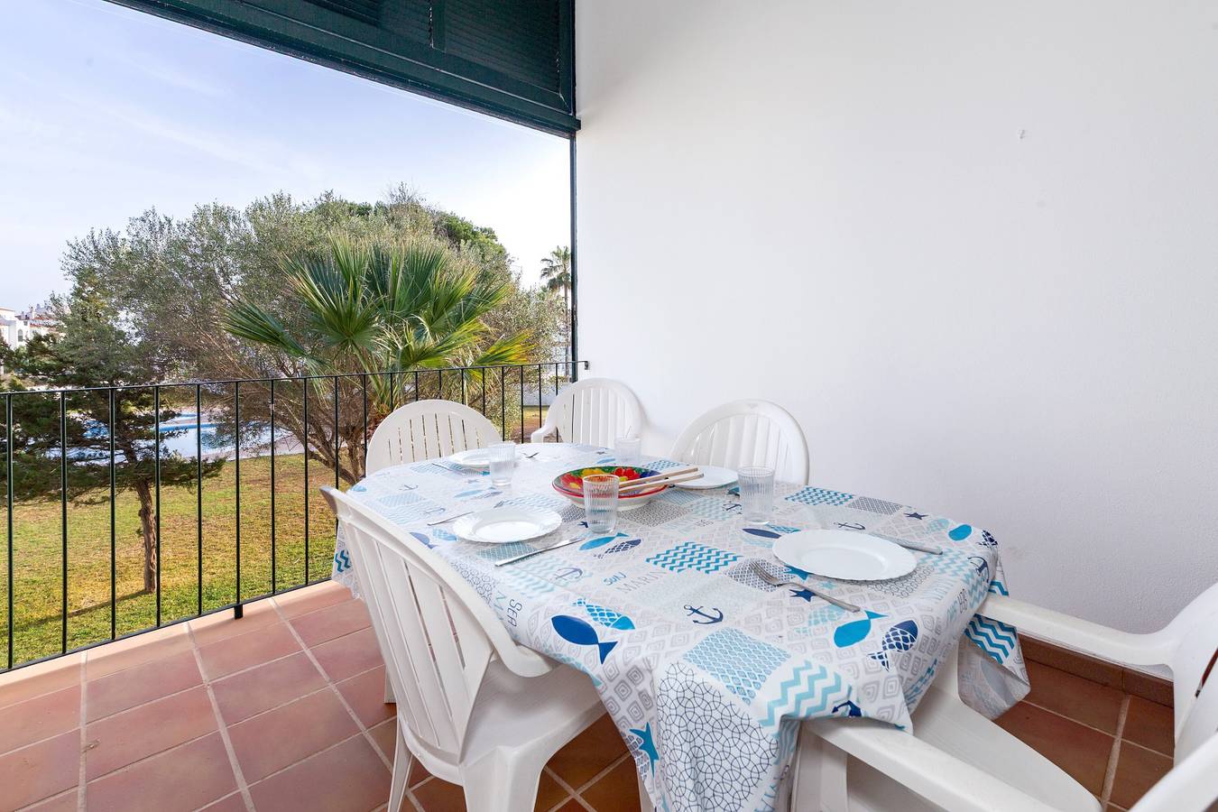 Casa de vacaciones 'Cala'n Bosch 1a Planta' con piscina compartida, jardín y aire acondicionado in Cala en Bosc, Ciudadela